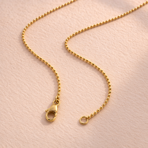 18k yellow gold bead chain necklace by Ruinette in flat-lay view, luxury handcrafted piece featuring polished gold beads, perfect for gifts.