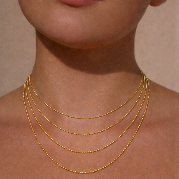 Ruinette Bead Chain Necklace, product-view, 18k yellow gold. Handcrafted luxury necklace, worn view, perfect for an elegant gift.