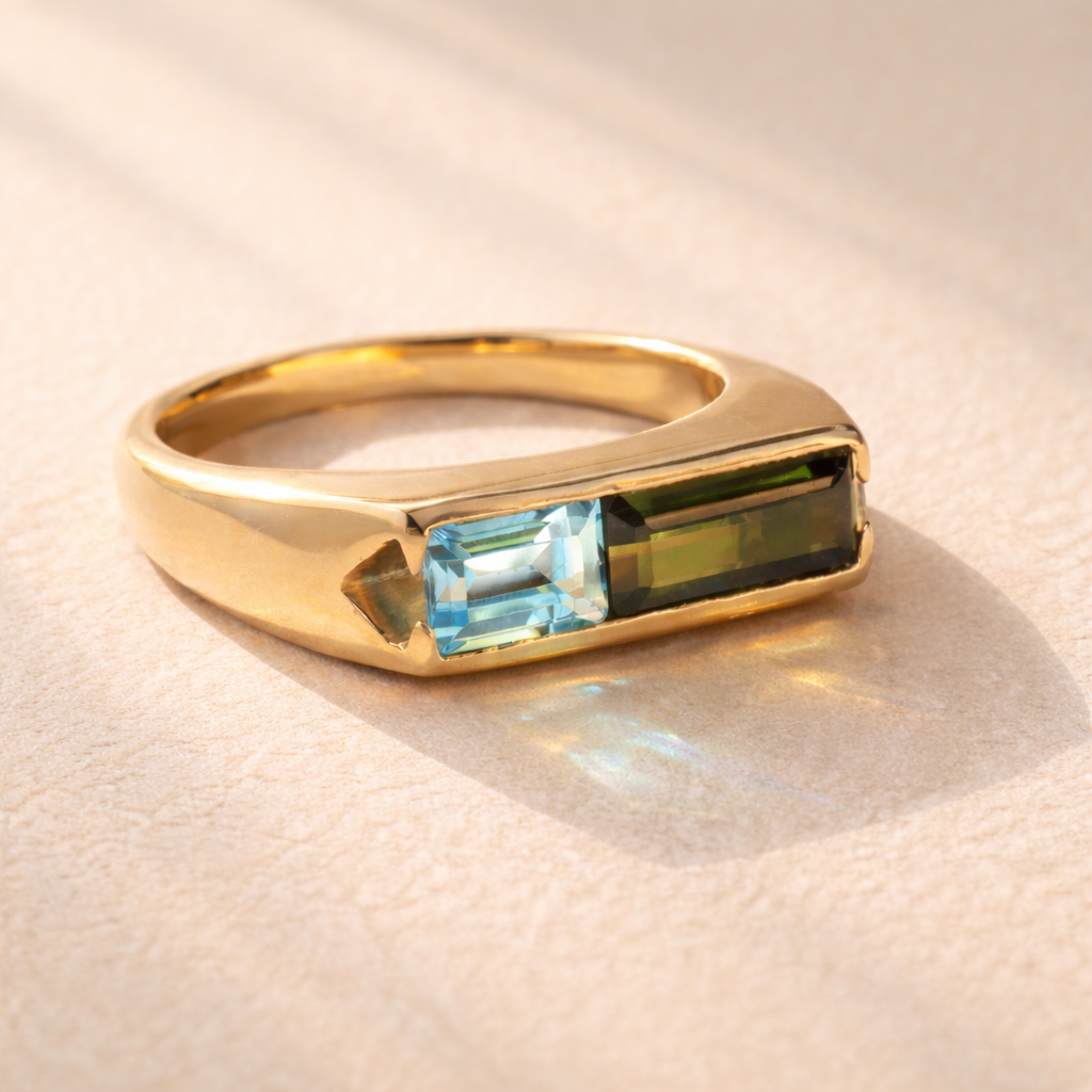 Green tourmaline, blue topaz baguettes, set in 18k gold, Duet Ring no. 01 by Ruinette, side view.